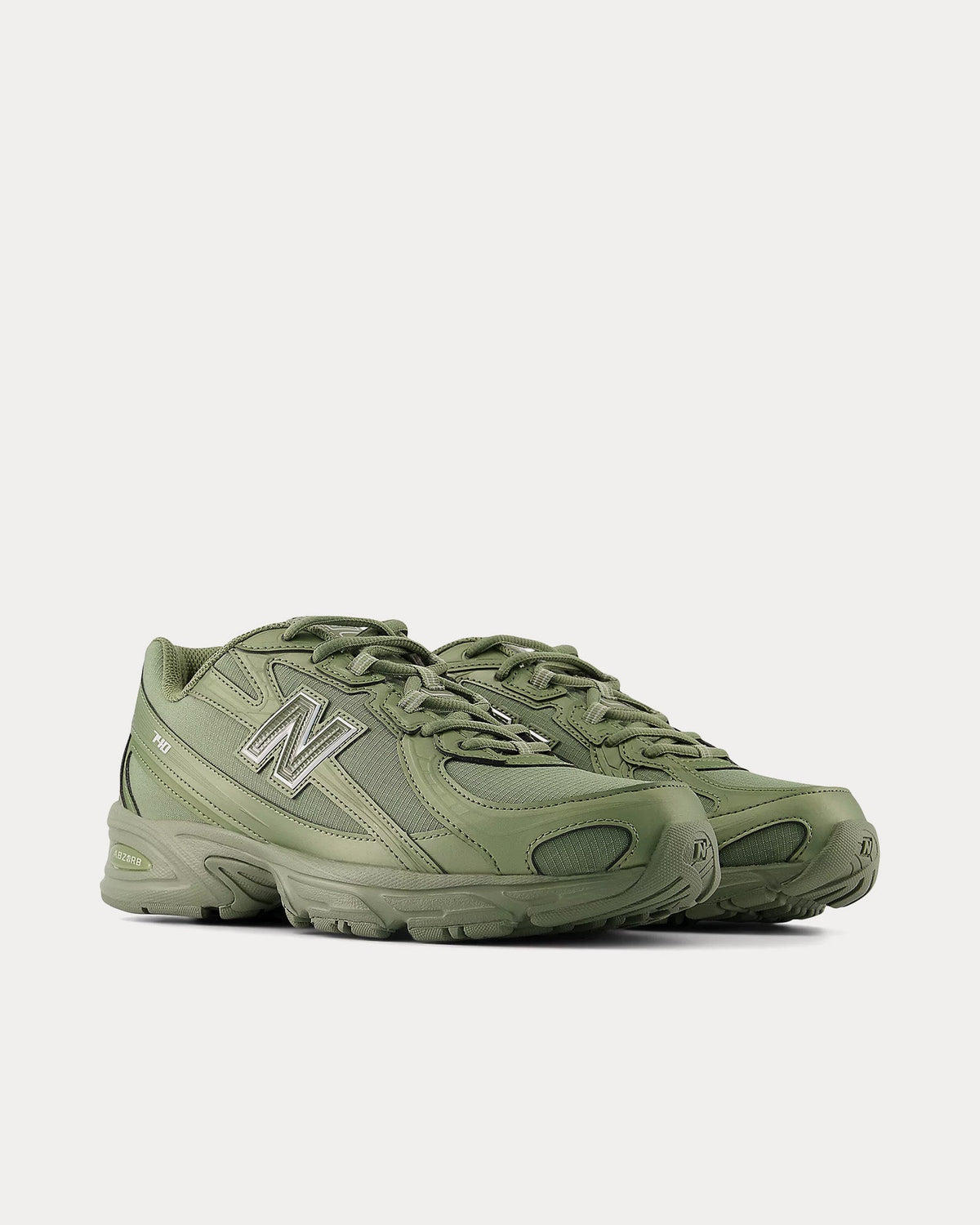 740 Dark Olivine / Silver Metallic Low Top Sneakers