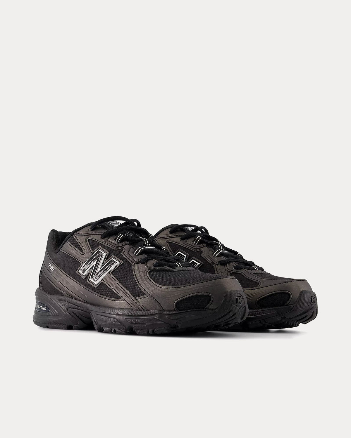740 Black / Silver Metallic Low Top Sneakers
