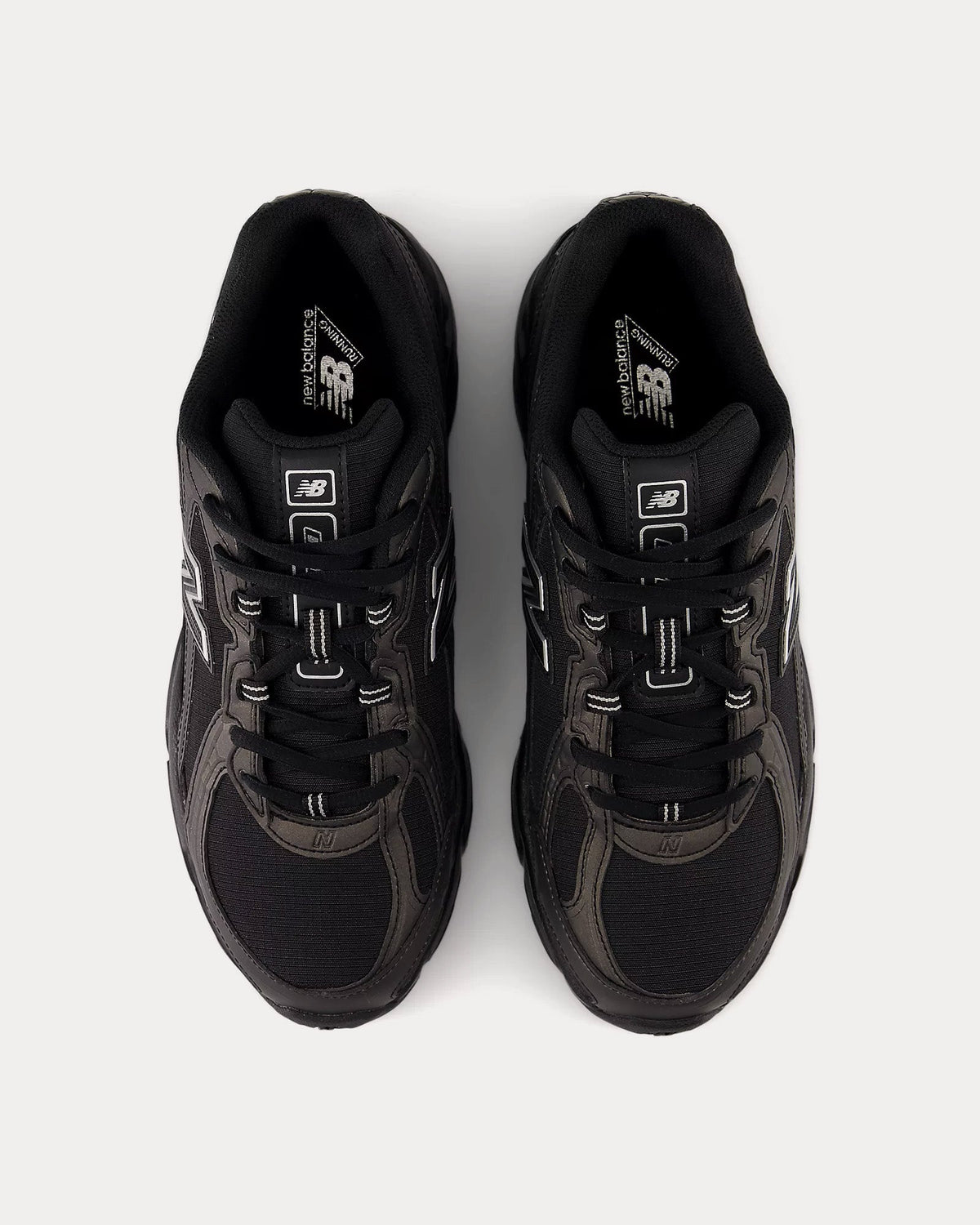 740 Black / Silver Metallic Low Top Sneakers